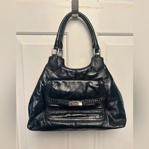 Cole Haan black patent leather shoulder bag w/silver accents.